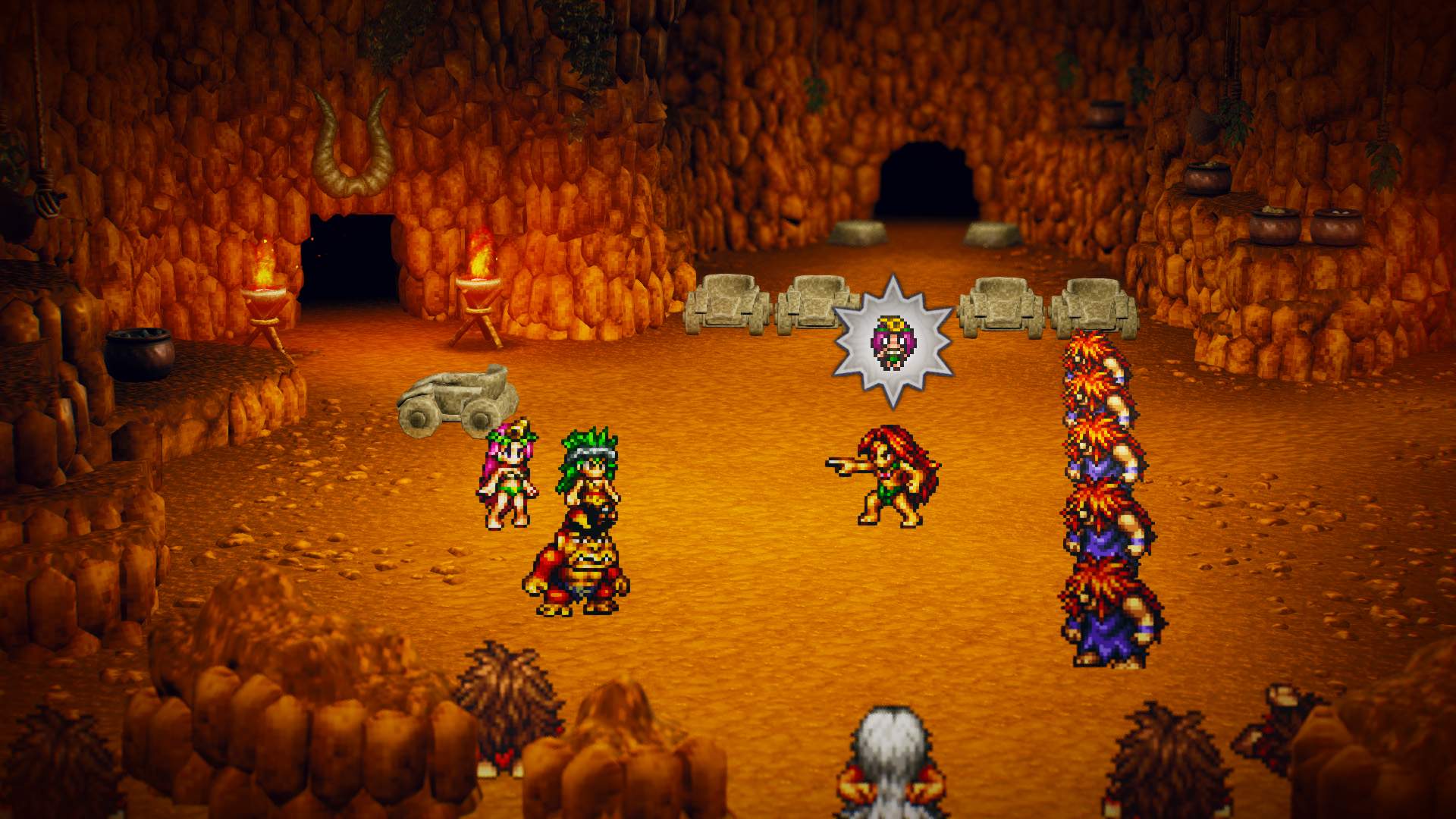 Characters from the Prehistory chapter in a cave being pointed at by their leader.