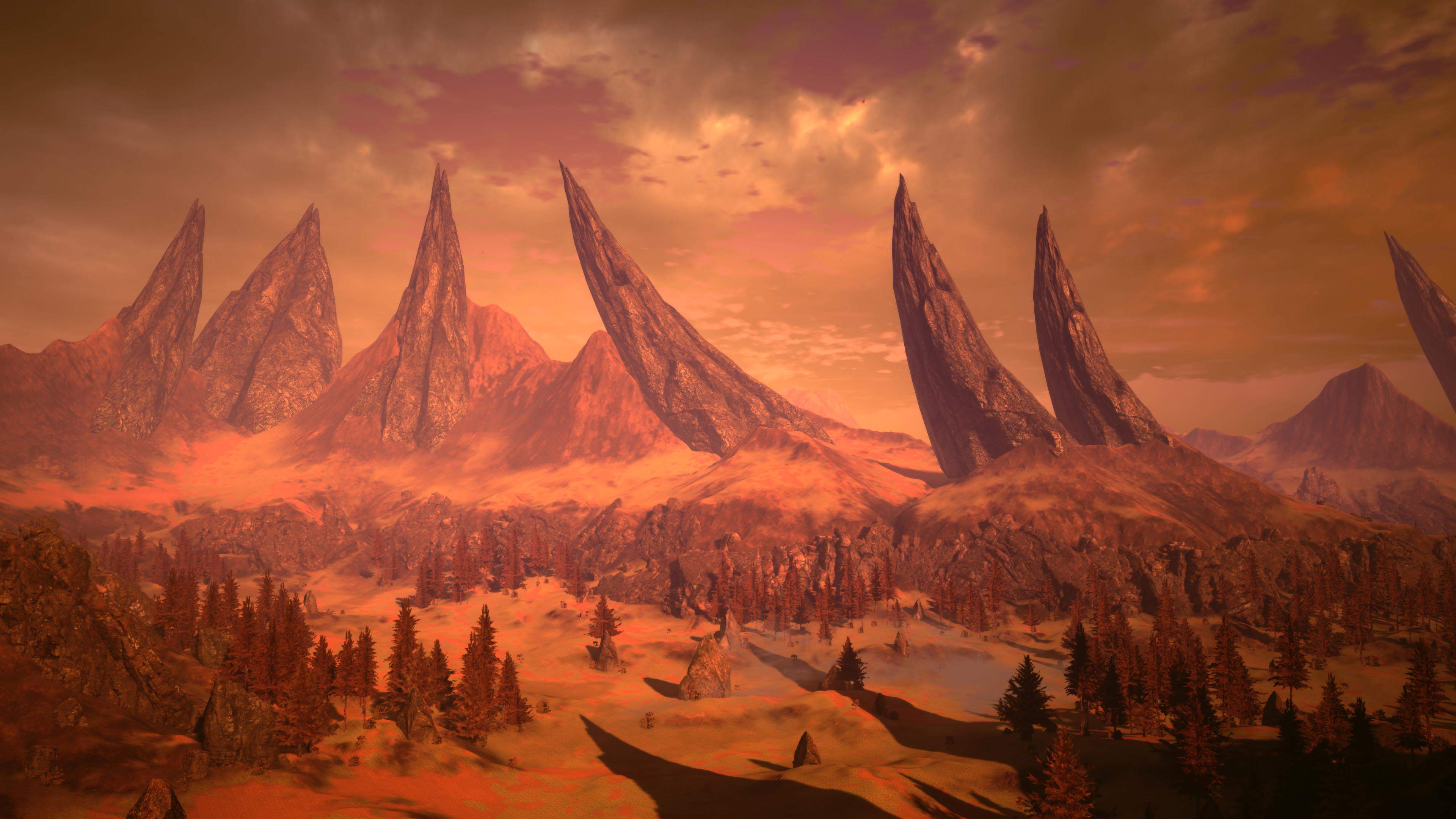 A landscape shot of a barren desert planet with dramatic mountains