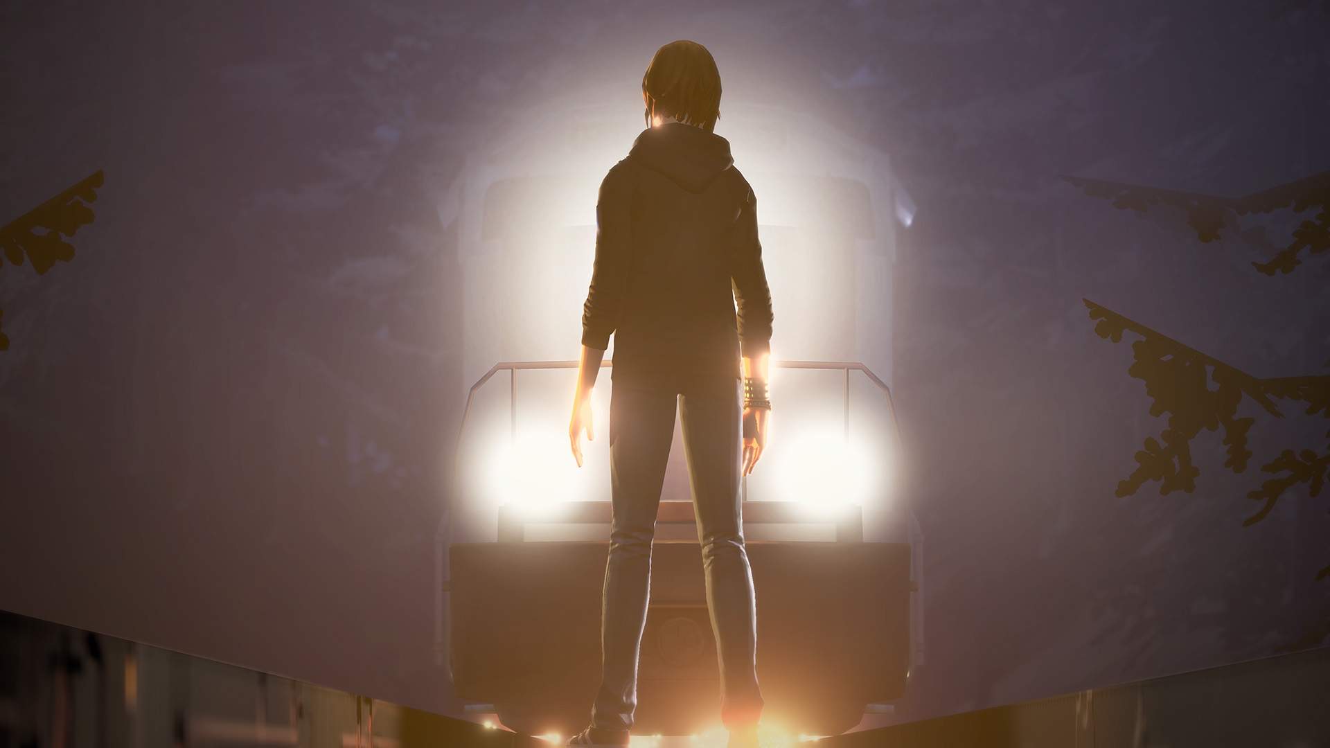 Lit by the headlamps of an oncoming freight train, Chloe Price stands defiant in the middle of the tracks.