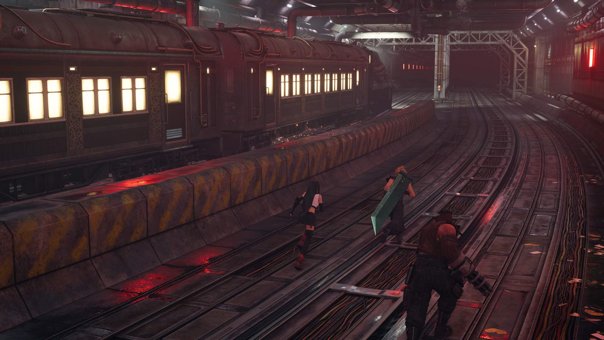 Cloud, Barret and Tifa run along a train line, as a train speeds past