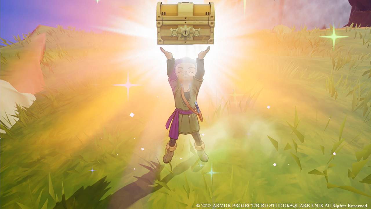 Erik holding up a chest