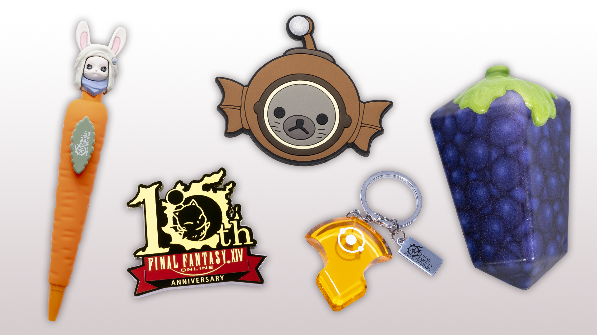 A collage showcasing the goody bag items: loporrit-themed pen, grebuloff magnet, azem's crystal keychain, 10th anniversary pin, and squishable Endwalker grapes.