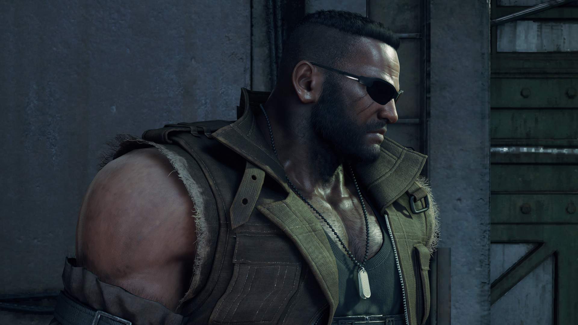 A side shot of Barret Wallace from FINAL FANTASY VII REMAKE. He is looking directly ahead with a serious expression on his face.