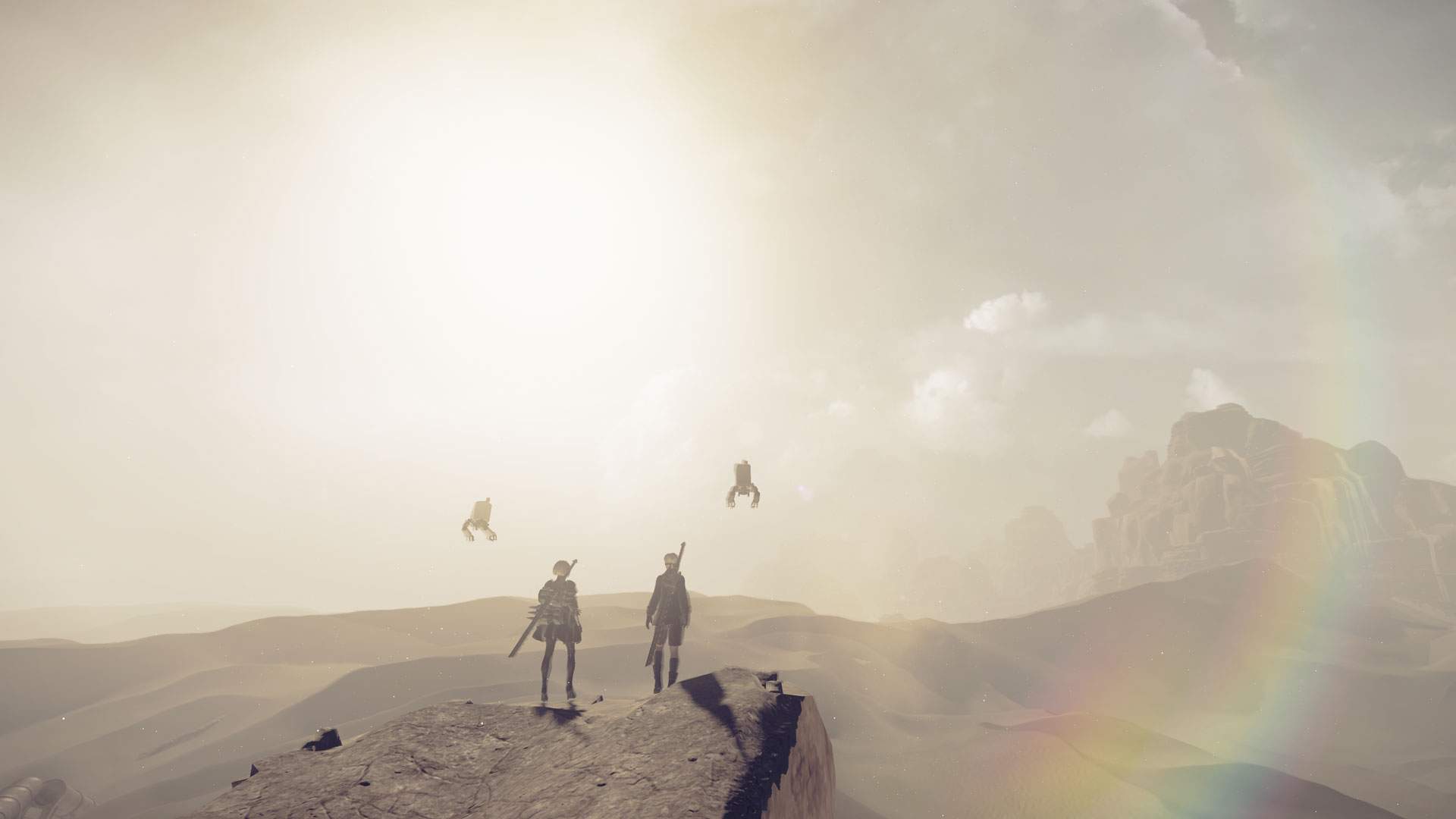 2B and 9S looking out at a vast desert in NieR:Automata